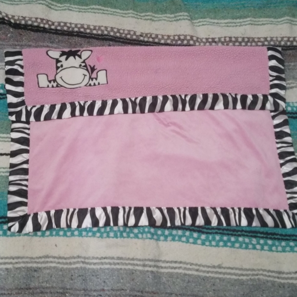 zebra blanket with pink trim